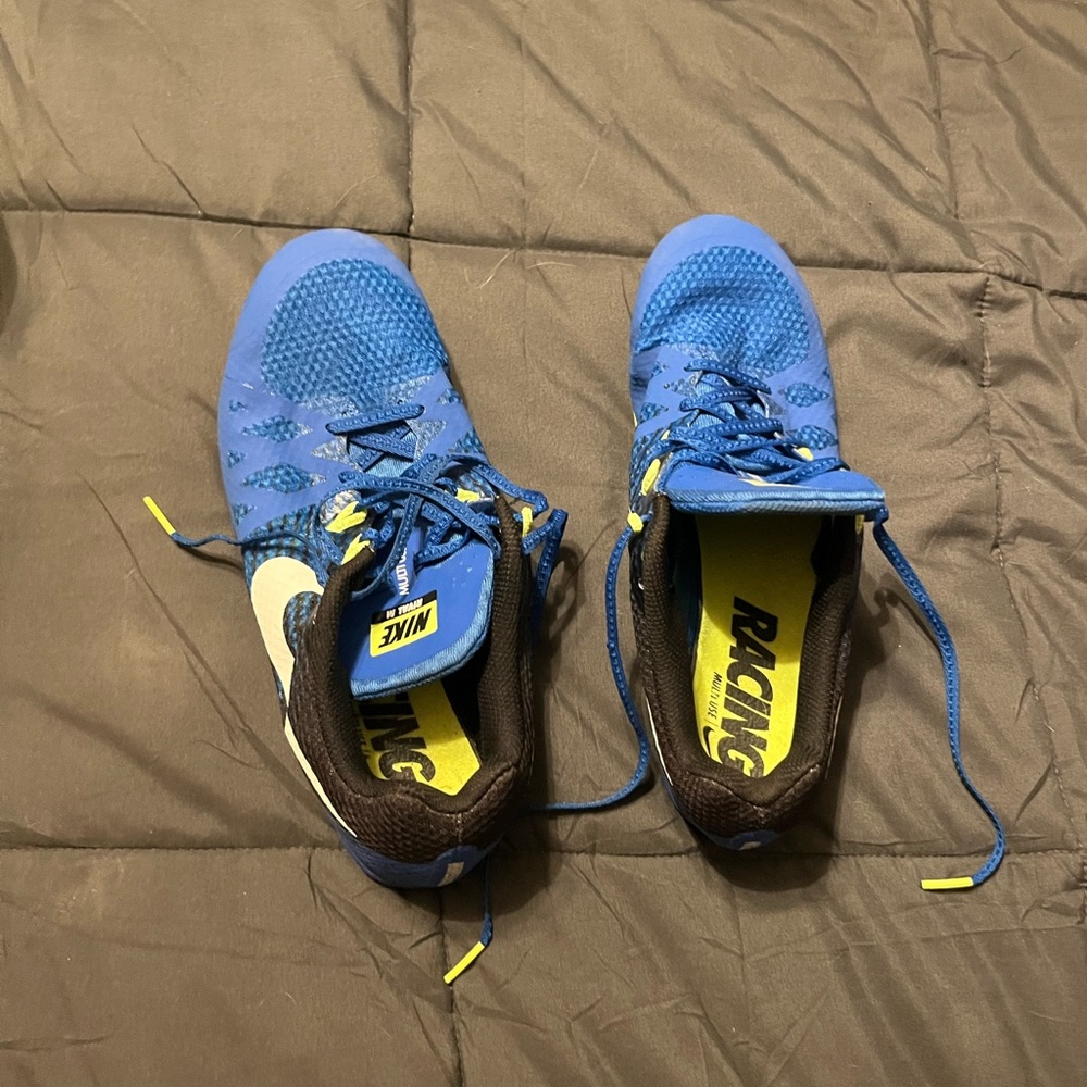 Selling Nike spikes.
